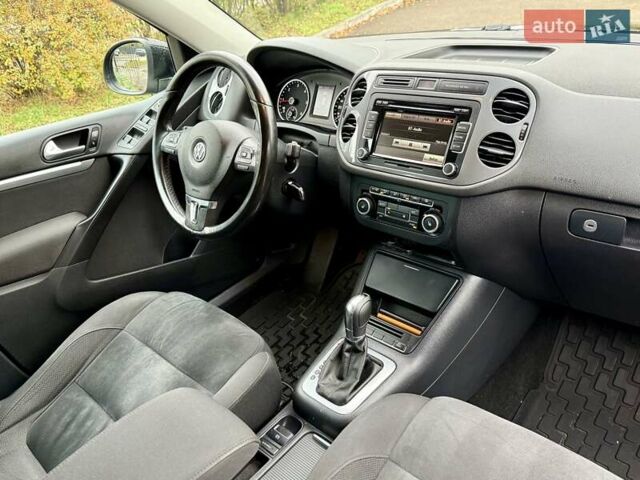 Черный Фольксваген Тигуан, объемом двигателя 1.97 л и пробегом 310 тыс. км за 14500 $, фото 19 на Automoto.ua