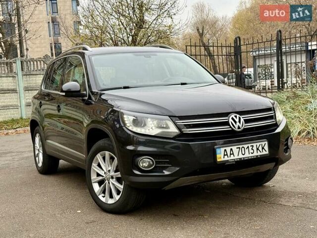 Черный Фольксваген Тигуан, объемом двигателя 1.97 л и пробегом 310 тыс. км за 14500 $, фото 1 на Automoto.ua