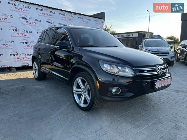 Чорний Фольксваген Тігуан, об'ємом двигуна 2 л та пробігом 159 тис. км за 14950 $, фото 2 на Automoto.ua