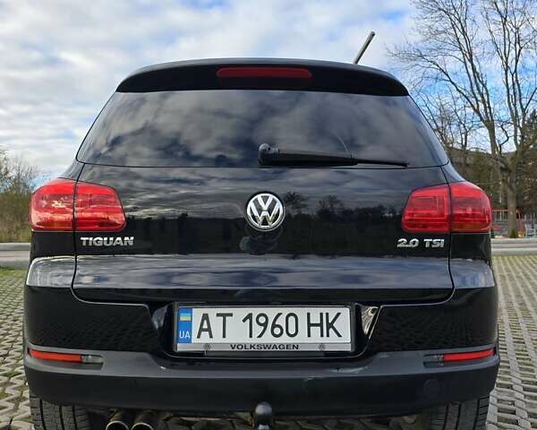 Чорний Фольксваген Тігуан, об'ємом двигуна 1.98 л та пробігом 349 тис. км за 12499 $, фото 2 на Automoto.ua
