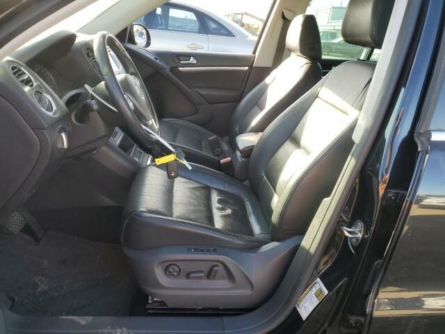 Чорний Фольксваген Тігуан, об'ємом двигуна 2 л та пробігом 172 тис. км за 9900 $, фото 6 на Automoto.ua