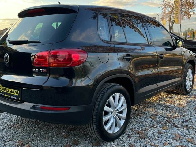 Чорний Фольксваген Тігуан, об'ємом двигуна 2 л та пробігом 200 тис. км за 10999 $, фото 5 на Automoto.ua