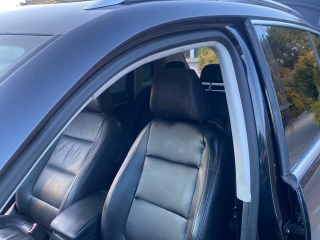 Черный Фольксваген Тигуан, объемом двигателя 2 л и пробегом 182 тыс. км за 11200 $, фото 6 на Automoto.ua