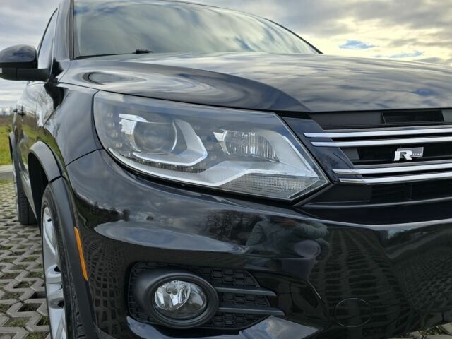 Чорний Фольксваген Тігуан, об'ємом двигуна 2 л та пробігом 194 тис. км за 12499 $, фото 4 на Automoto.ua