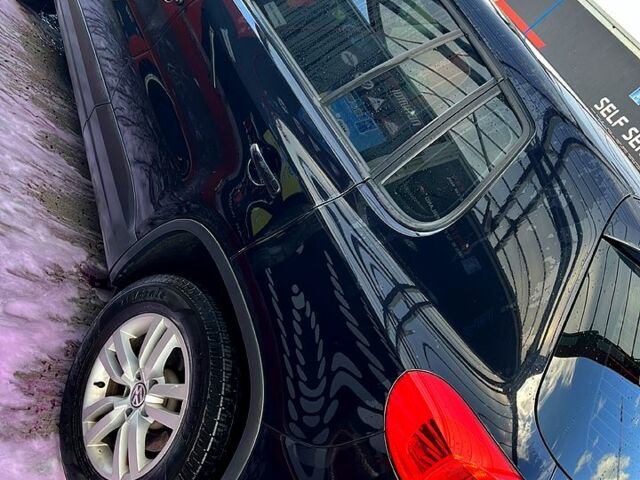 Чорний Фольксваген Тігуан, об'ємом двигуна 2 л та пробігом 261 тис. км за 13000 $, фото 11 на Automoto.ua