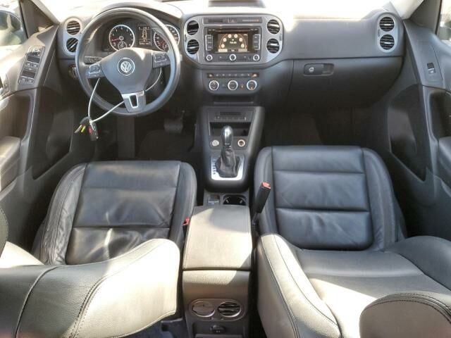 Чорний Фольксваген Тігуан, об'ємом двигуна 2 л та пробігом 172 тис. км за 9900 $, фото 7 на Automoto.ua