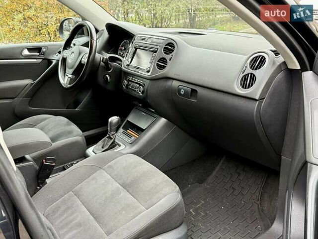 Черный Фольксваген Тигуан, объемом двигателя 1.97 л и пробегом 310 тыс. км за 14500 $, фото 18 на Automoto.ua