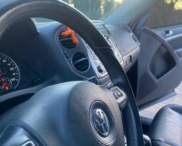 Чорний Фольксваген Тігуан, об'ємом двигуна 1.99 л та пробігом 180 тис. км за 11300 $, фото 58 на Automoto.ua