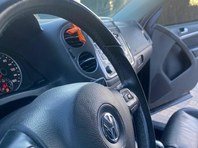 Чорний Фольксваген Тігуан, об'ємом двигуна 2 л та пробігом 182 тис. км за 11200 $, фото 5 на Automoto.ua