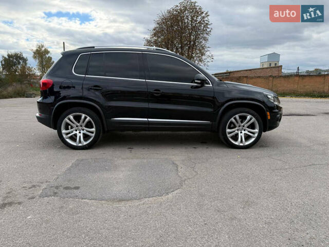 Чорний Фольксваген Тігуан, об'ємом двигуна 2 л та пробігом 200 тис. км за 12900 $, фото 1 на Automoto.ua