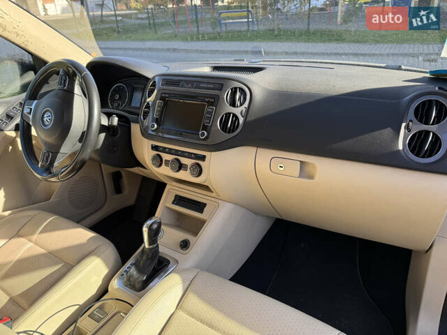 Чорний Фольксваген Тігуан, об'ємом двигуна 1.98 л та пробігом 115 тис. км за 10999 $, фото 14 на Automoto.ua