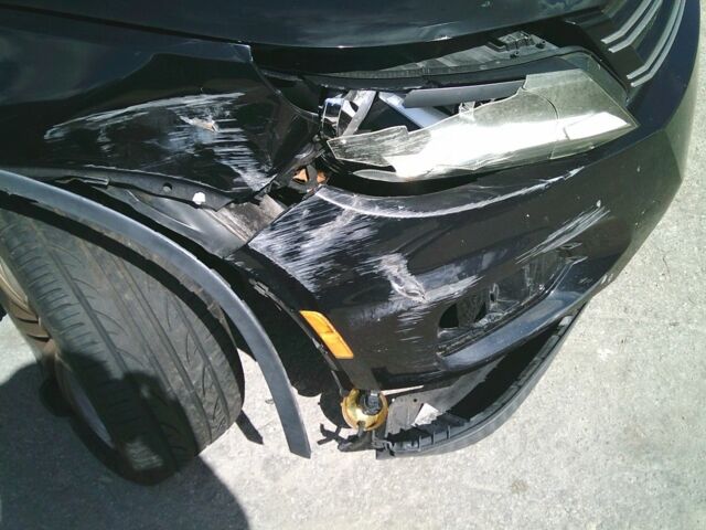 Чорний Фольксваген Тігуан, об'ємом двигуна 2 л та пробігом 156 тис. км за 7000 $, фото 2 на Automoto.ua