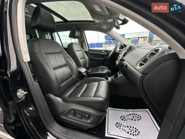 Чорний Фольксваген Тігуан, об'ємом двигуна 1.98 л та пробігом 168 тис. км за 13750 $, фото 114 на Automoto.ua