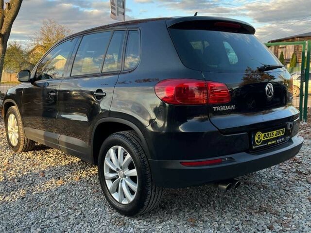 Чорний Фольксваген Тігуан, об'ємом двигуна 2 л та пробігом 200 тис. км за 10999 $, фото 7 на Automoto.ua
