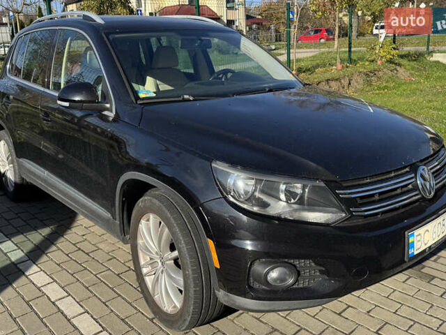 Чорний Фольксваген Тігуан, об'ємом двигуна 1.98 л та пробігом 115 тис. км за 10999 $, фото 1 на Automoto.ua