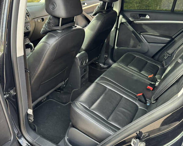 Черный Фольксваген Тигуан, объемом двигателя 2 л и пробегом 206 тыс. км за 12100 $, фото 12 на Automoto.ua