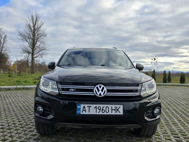 Чорний Фольксваген Тігуан, об'ємом двигуна 2 л та пробігом 194 тис. км за 12499 $, фото 3 на Automoto.ua