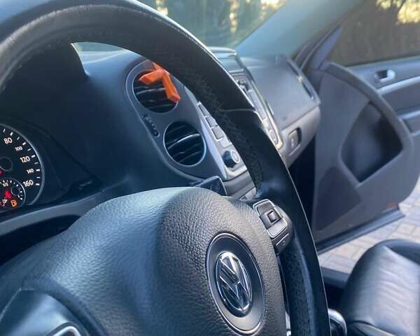 Чорний Фольксваген Тігуан, об'ємом двигуна 1.99 л та пробігом 180 тис. км за 11300 $, фото 62 на Automoto.ua