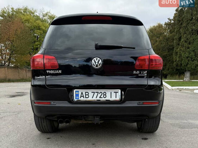 Чорний Фольксваген Тігуан, об'ємом двигуна 2 л та пробігом 200 тис. км за 12900 $, фото 2 на Automoto.ua
