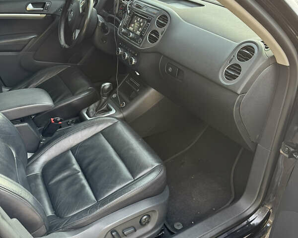 Черный Фольксваген Тигуан, объемом двигателя 2 л и пробегом 206 тыс. км за 12100 $, фото 8 на Automoto.ua