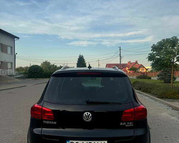 Чорний Фольксваген Тігуан, об'ємом двигуна 2 л та пробігом 260 тис. км за 13000 $, фото 2 на Automoto.ua