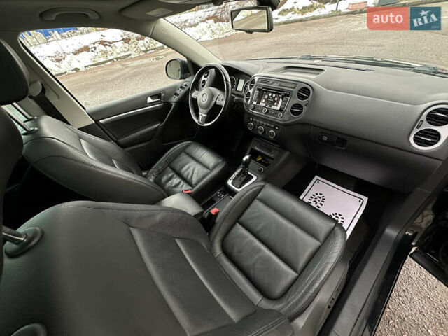 Чорний Фольксваген Тігуан, об'ємом двигуна 1.98 л та пробігом 168 тис. км за 13750 $, фото 115 на Automoto.ua