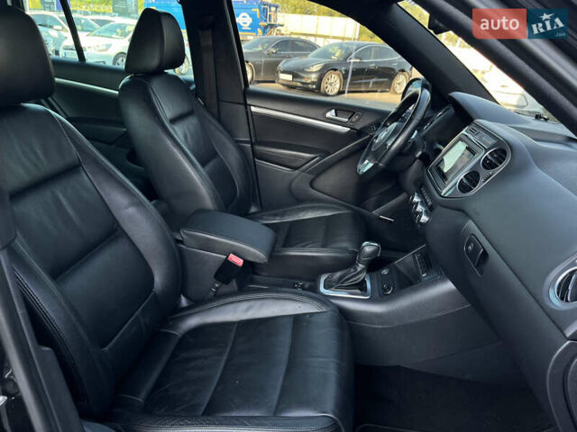 Чорний Фольксваген Тігуан, об'ємом двигуна 2 л та пробігом 159 тис. км за 14950 $, фото 23 на Automoto.ua