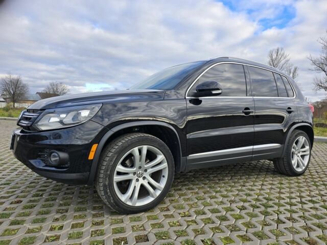 Чорний Фольксваген Тігуан, об'ємом двигуна 2 л та пробігом 194 тис. км за 12499 $, фото 1 на Automoto.ua
