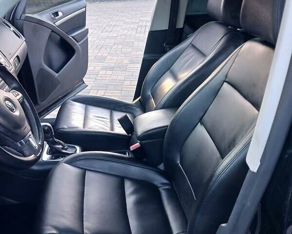 Чорний Фольксваген Тігуан, об'ємом двигуна 1.99 л та пробігом 180 тис. км за 11300 $, фото 71 на Automoto.ua