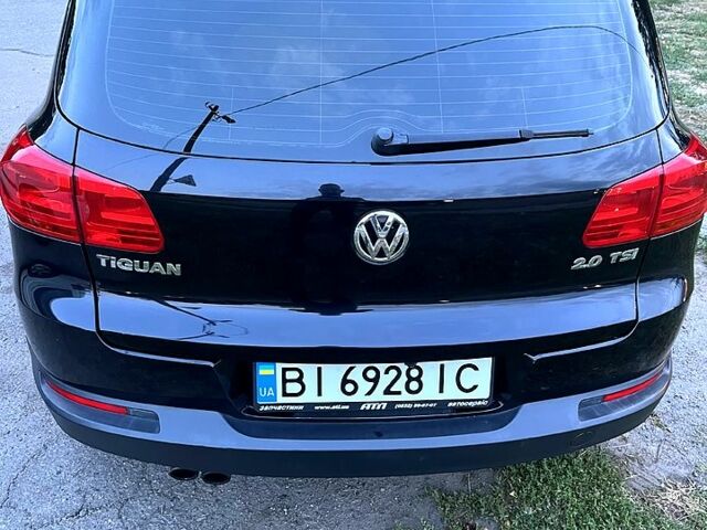 Чорний Фольксваген Тігуан, об'ємом двигуна 2 л та пробігом 261 тис. км за 13000 $, фото 3 на Automoto.ua