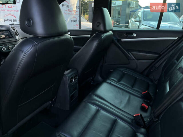 Чорний Фольксваген Тігуан, об'ємом двигуна 2 л та пробігом 159 тис. км за 14950 $, фото 26 на Automoto.ua