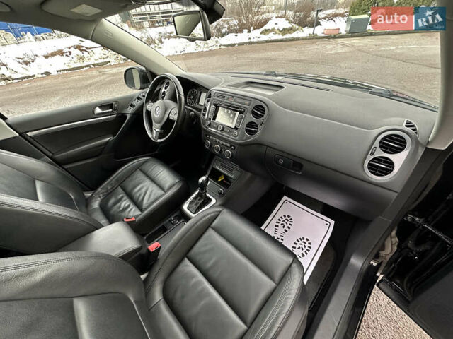 Чорний Фольксваген Тігуан, об'ємом двигуна 1.98 л та пробігом 168 тис. км за 13750 $, фото 117 на Automoto.ua