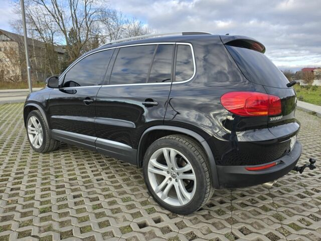 Чорний Фольксваген Тігуан, об'ємом двигуна 2 л та пробігом 194 тис. км за 12499 $, фото 5 на Automoto.ua