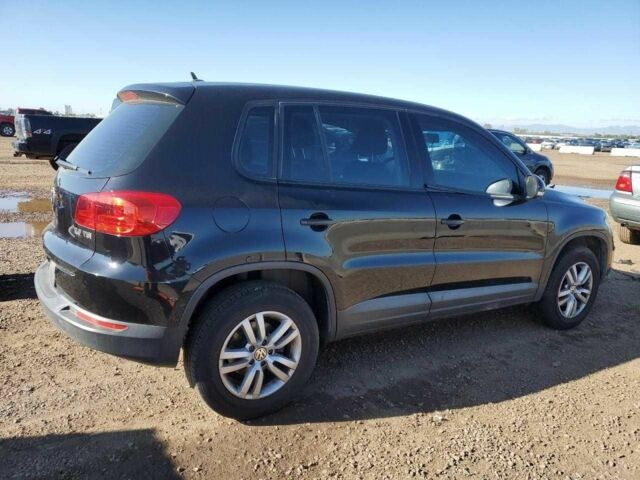 Черный Фольксваген Тигуан, объемом двигателя 2 л и пробегом 118 тыс. км за 1200 $, фото 2 на Automoto.ua