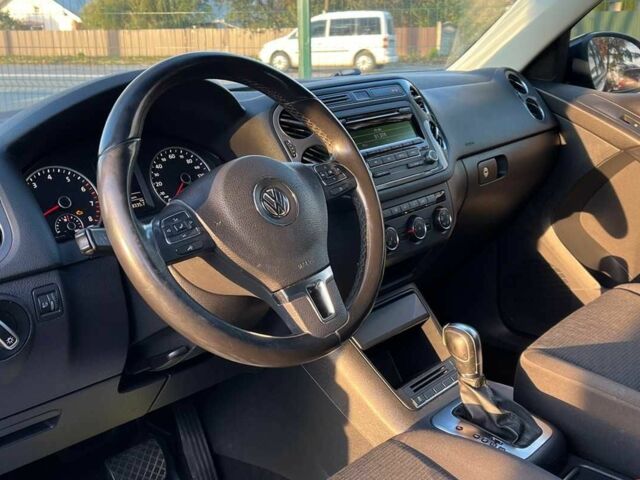 Чорний Фольксваген Тігуан, об'ємом двигуна 2 л та пробігом 200 тис. км за 10999 $, фото 8 на Automoto.ua