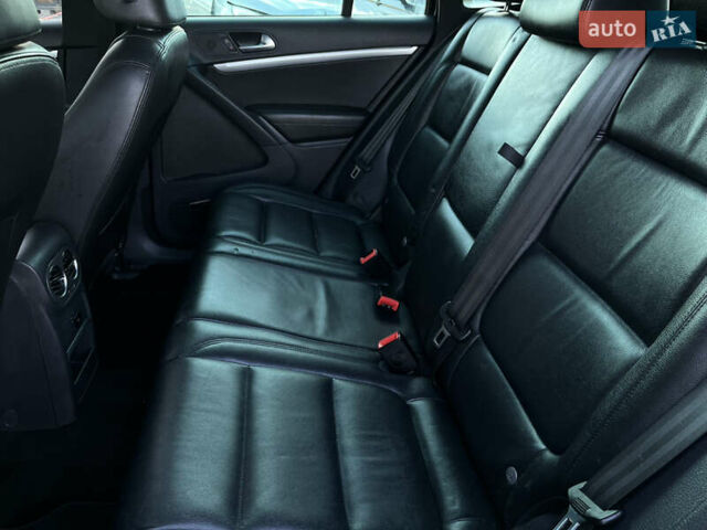 Чорний Фольксваген Тігуан, об'ємом двигуна 2 л та пробігом 159 тис. км за 14950 $, фото 27 на Automoto.ua