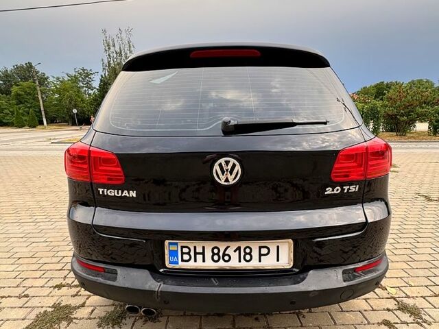Чорний Фольксваген Тігуан, об'ємом двигуна 2 л та пробігом 229 тис. км за 10500 $, фото 4 на Automoto.ua