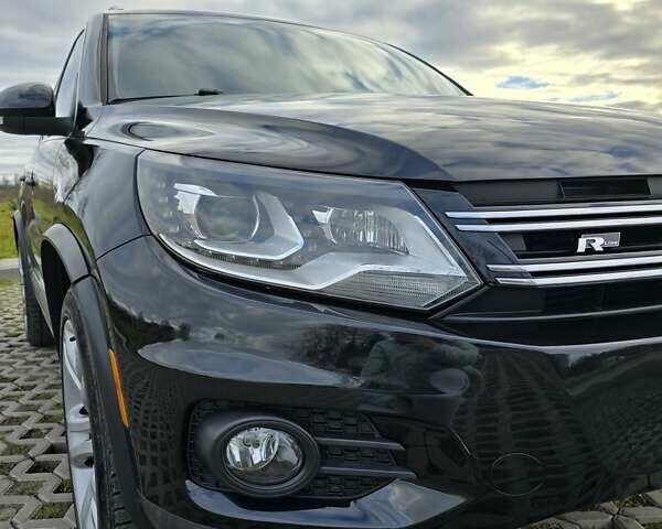 Чорний Фольксваген Тігуан, об'ємом двигуна 1.98 л та пробігом 349 тис. км за 12499 $, фото 4 на Automoto.ua