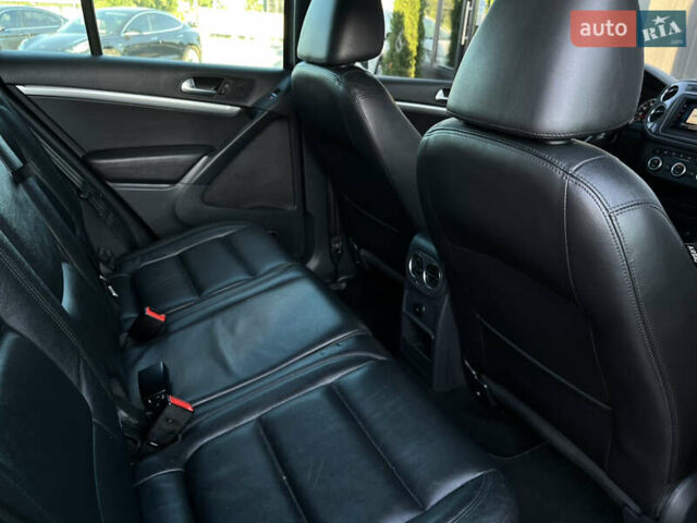 Чорний Фольксваген Тігуан, об'ємом двигуна 2 л та пробігом 159 тис. км за 14950 $, фото 28 на Automoto.ua