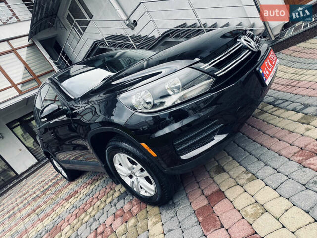 Чорний Фольксваген Тігуан, об'ємом двигуна 0 л та пробігом 240 тис. км за 11500 $, фото 32 на Automoto.ua