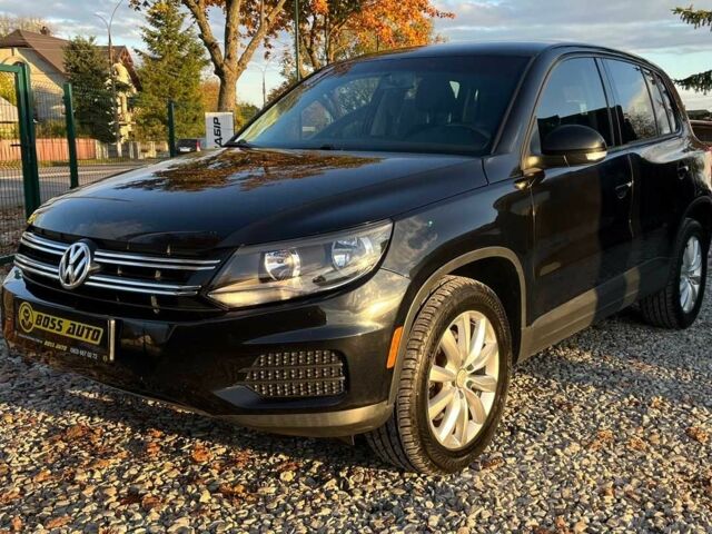 Чорний Фольксваген Тігуан, об'ємом двигуна 2 л та пробігом 200 тис. км за 10999 $, фото 4 на Automoto.ua