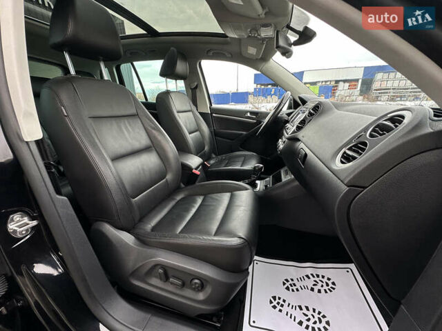 Чорний Фольксваген Тігуан, об'ємом двигуна 1.98 л та пробігом 168 тис. км за 13750 $, фото 113 на Automoto.ua