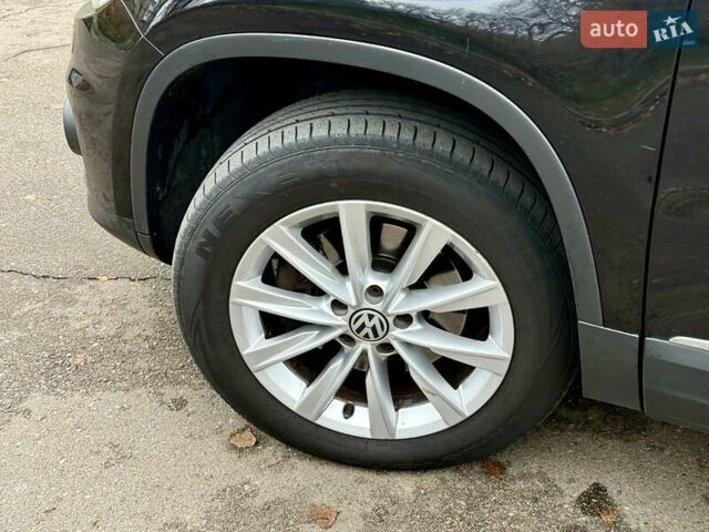 Черный Фольксваген Тигуан, объемом двигателя 1.97 л и пробегом 310 тыс. км за 14500 $, фото 13 на Automoto.ua