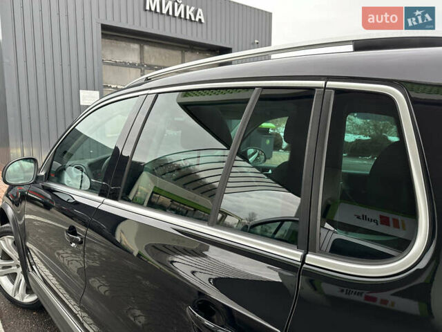 Чорний Фольксваген Тігуан, об'ємом двигуна 1.98 л та пробігом 168 тис. км за 13750 $, фото 39 на Automoto.ua