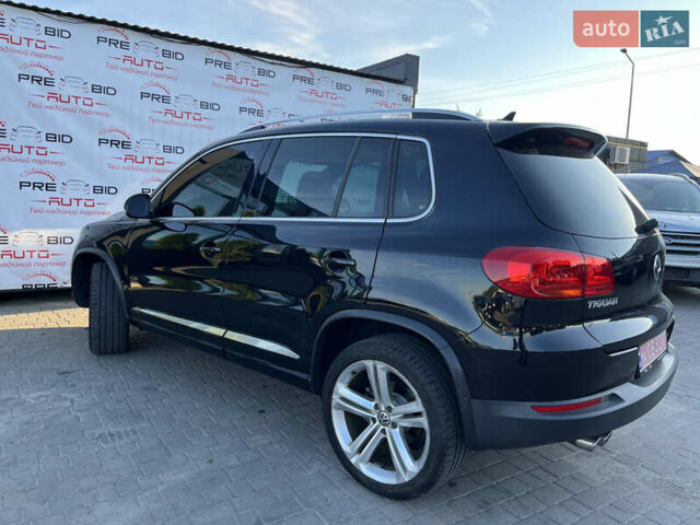 Чорний Фольксваген Тігуан, об'ємом двигуна 2 л та пробігом 159 тис. км за 14950 $, фото 4 на Automoto.ua