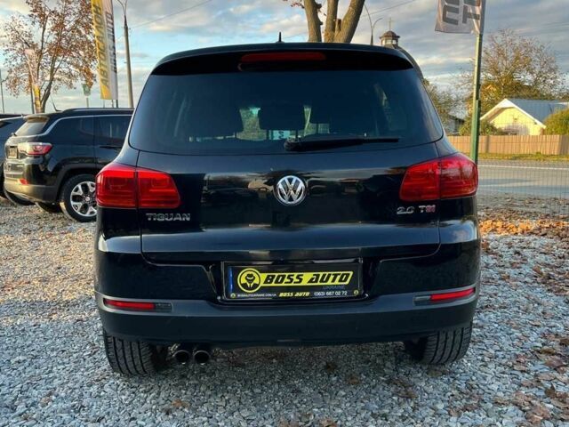 Чорний Фольксваген Тігуан, об'ємом двигуна 2 л та пробігом 200 тис. км за 10999 $, фото 6 на Automoto.ua