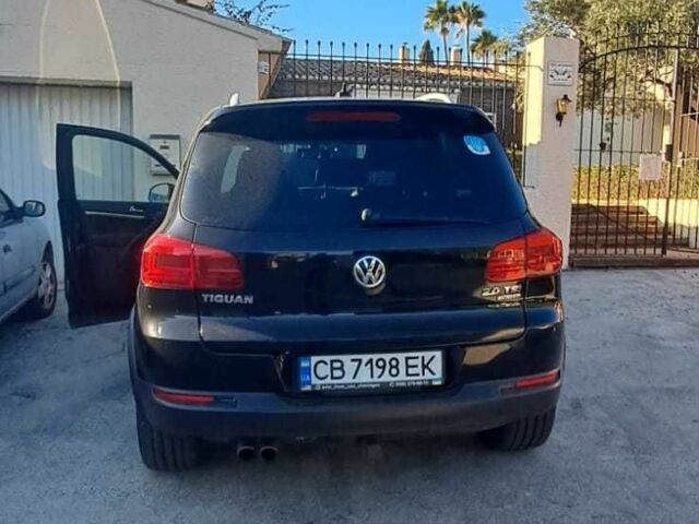 Чорний Фольксваген Тігуан, об'ємом двигуна 2 л та пробігом 231 тис. км за 12000 $, фото 4 на Automoto.ua