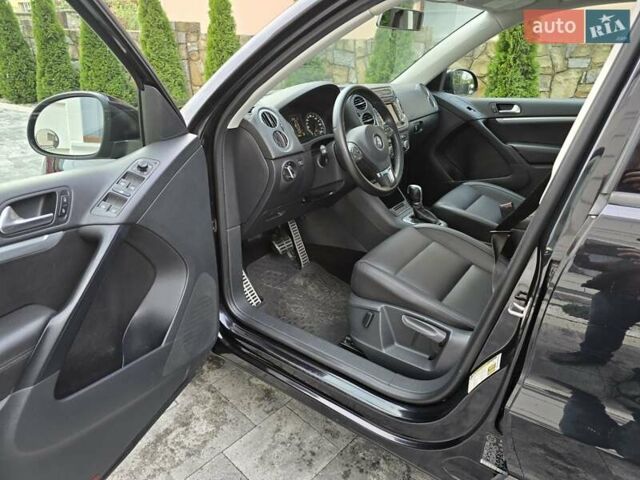 Чорний Фольксваген Тігуан, об'ємом двигуна 2 л та пробігом 169 тис. км за 13550 $, фото 9 на Automoto.ua