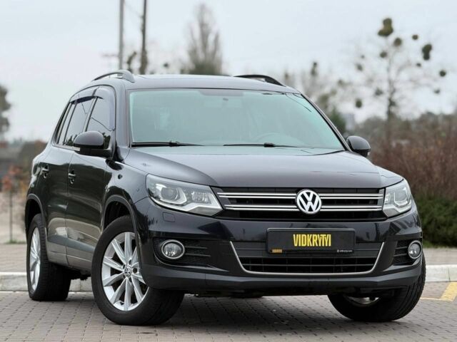 Чорний Фольксваген Тігуан, об'ємом двигуна 2 л та пробігом 145 тис. км за 12650 $, фото 2 на Automoto.ua
