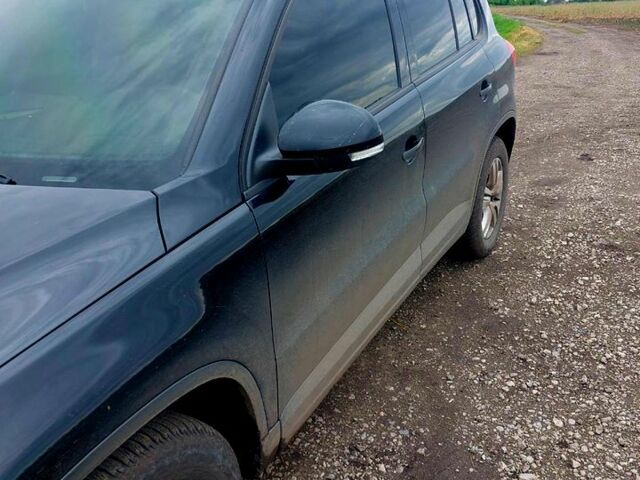 Черный Фольксваген Тигуан, объемом двигателя 2 л и пробегом 340 тыс. км за 14500 $, фото 1 на Automoto.ua